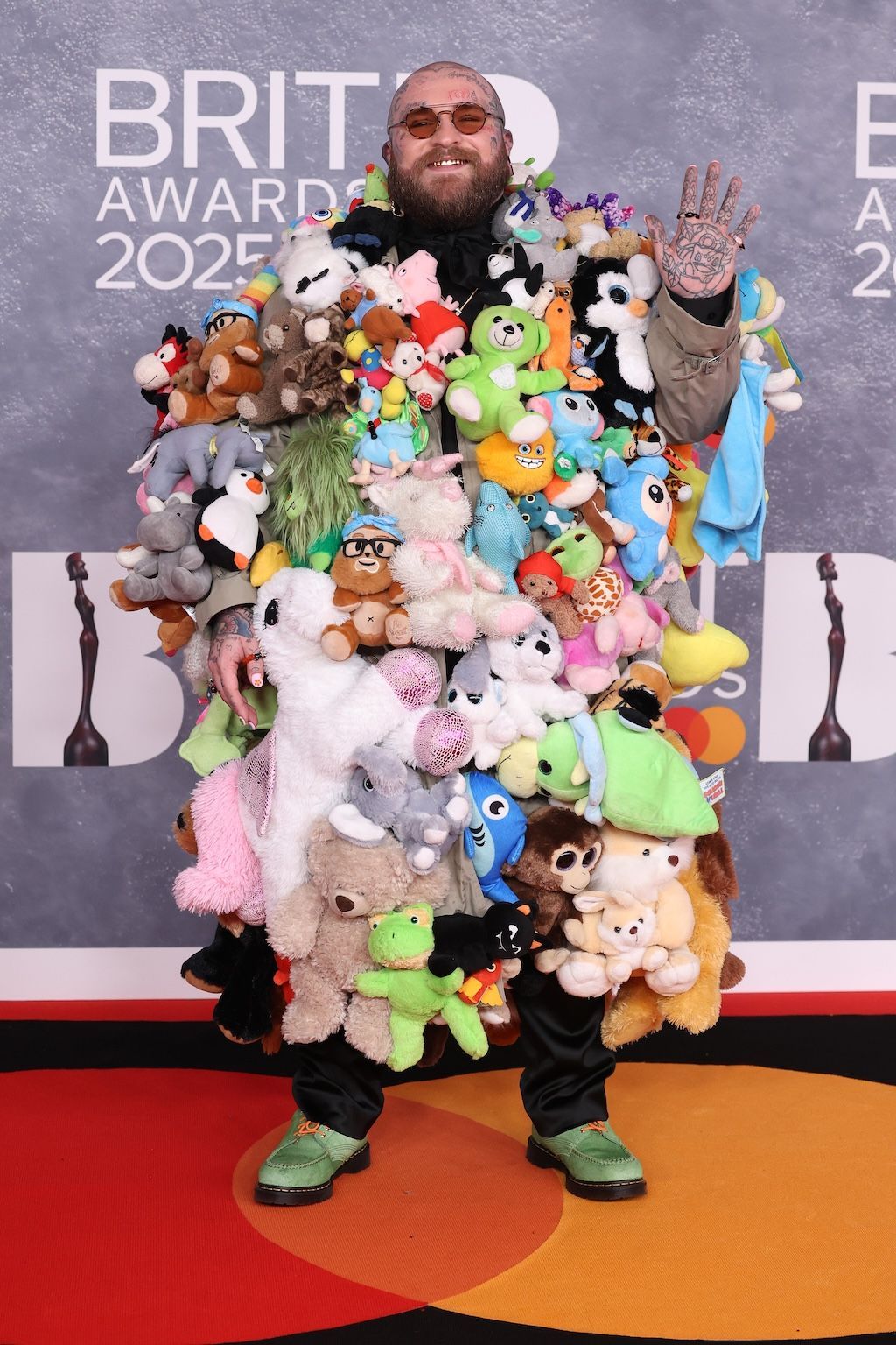 US singer-songwriter Teddy Swims wears a floor-length coat, decorated with hundreds of teddy bears