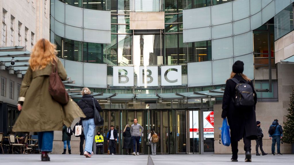People heading into the BBC's New Broadcasting House building in London