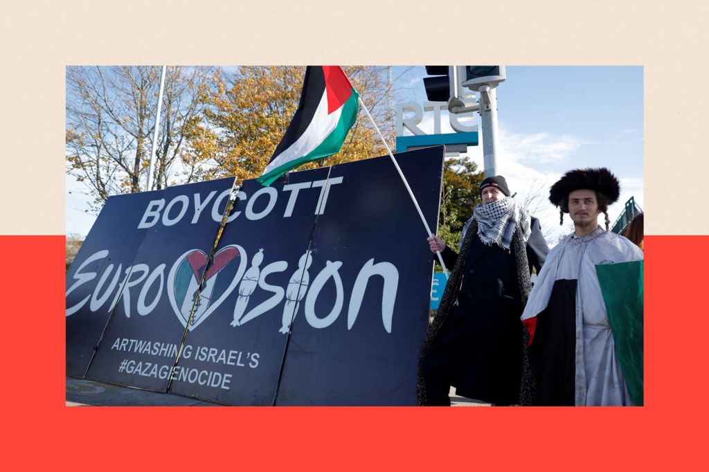 Pro-Palestinian protestors hold a flag and a banner outside the RTÉ (Radio Telefis Eireann) Irish public service broadcaster television studios