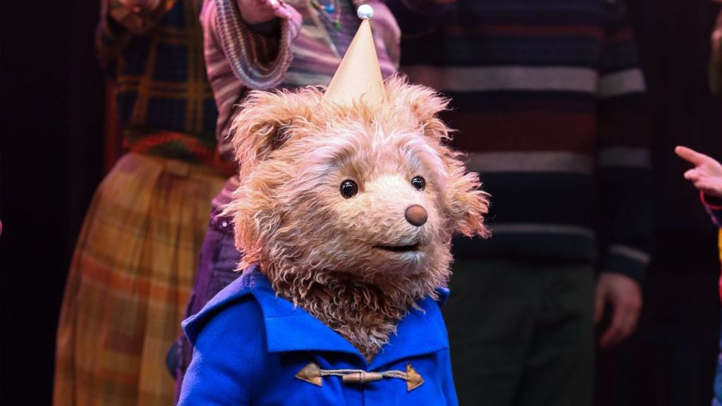 Paddington during curtain call at the "Paddington: The Musical" West End Opening Night at The Savoy Theatre on November 30, 2025 in London, England