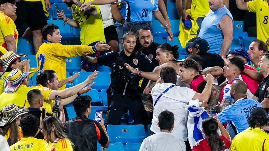 Uruguay forward Darwin Nunez engages with Colombia fans in the stands after the final whistle in the Copa America semi-final