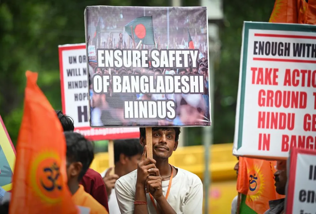 People representing various Hindu organizations seen protesting for the security of Hindu minorities in Bangladesh at Jantar Mantar on August 18, 2024 in New Delhi, India. (Photo by Sanchit Khanna/Hindustan Times via Getty Images)