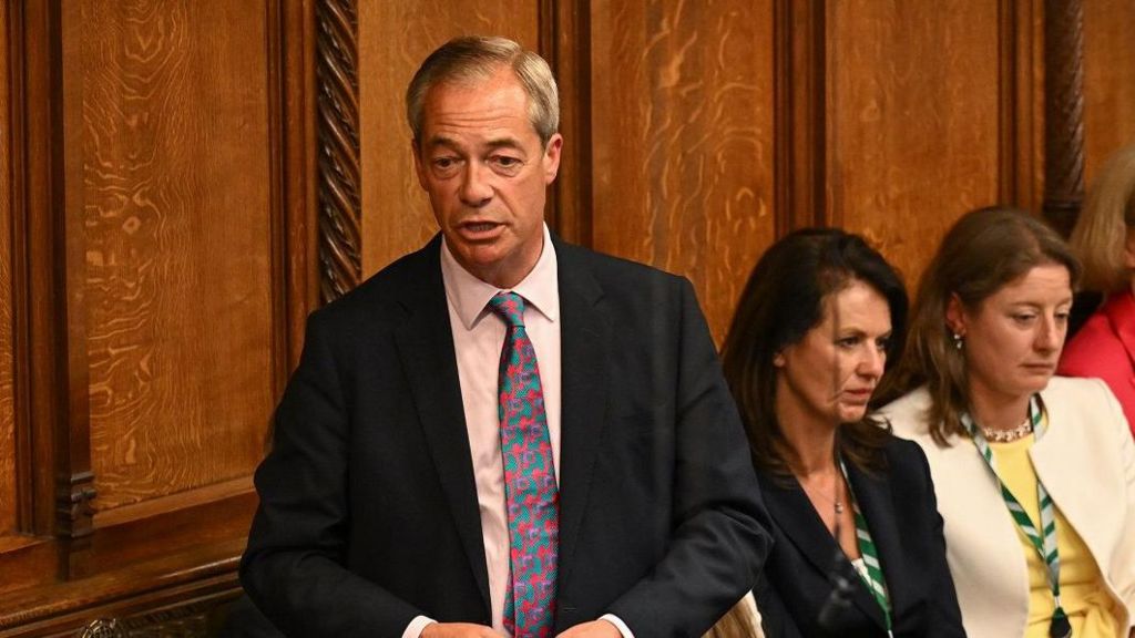 Reform UK leader Nigel Farage stands to speak in the Commons