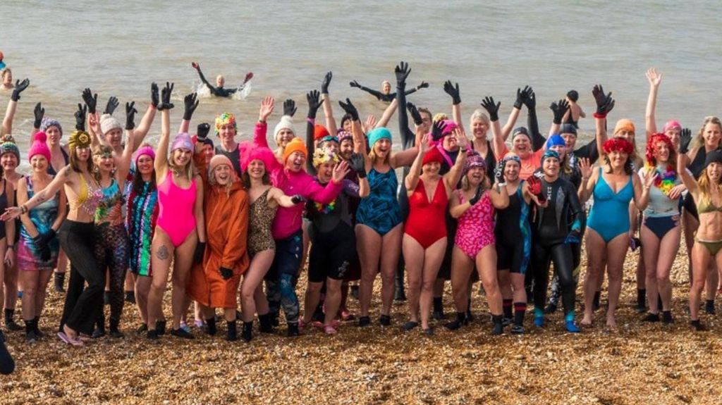 Competitors in International Women's Day sea swim in Brighton 2023 