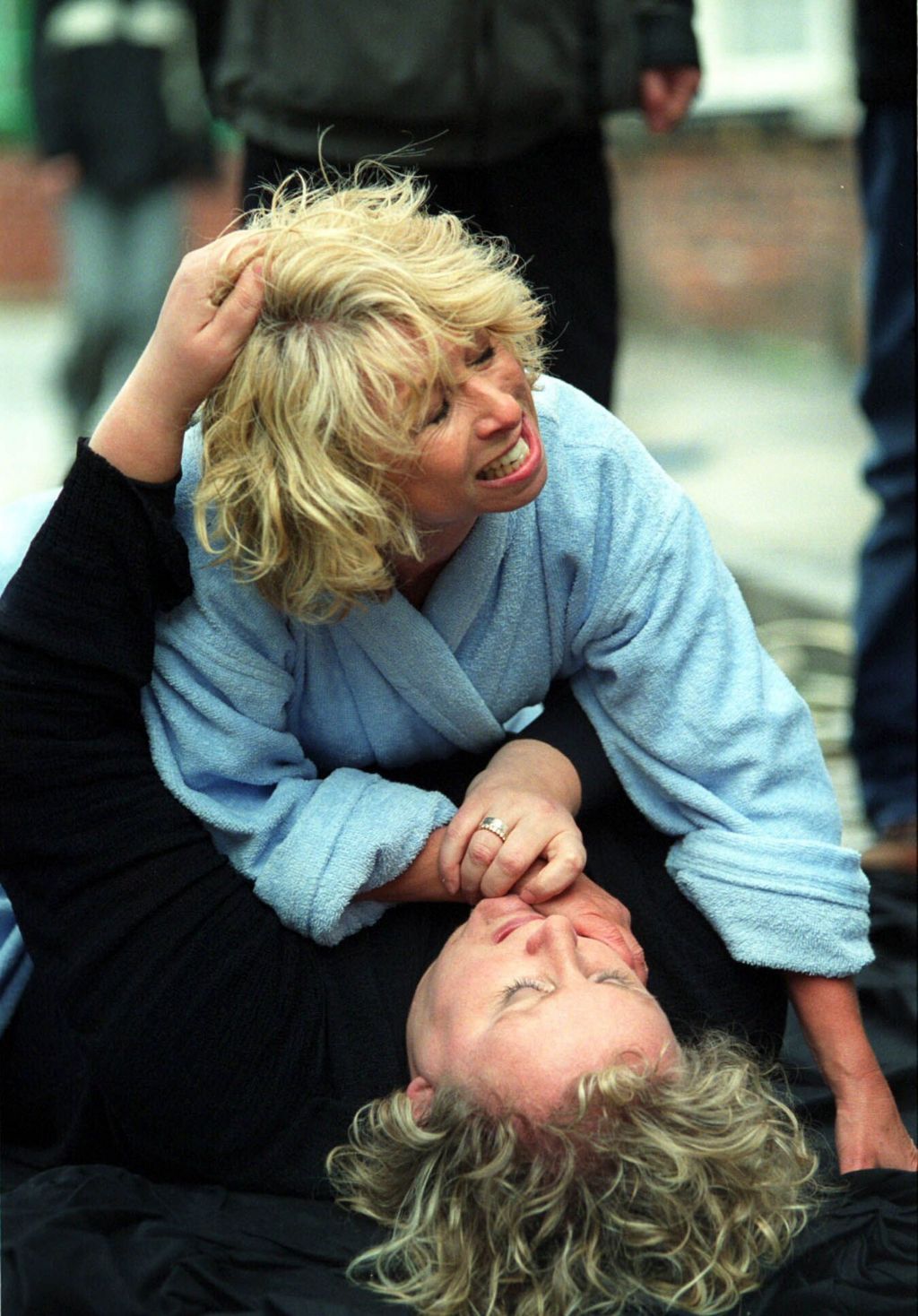 Gail fighting in the street with Eileen