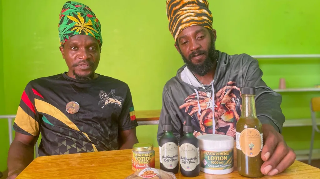 High Priest Selah of Antigua’s Nyabinghi community, left, and fellow Rastafarian Andre Solomon, with some of the the community's cannabis products


