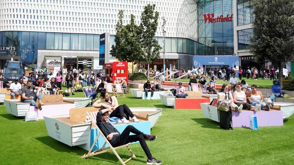 Fans watching the Tokyo Olympics at the Westfield fan zone 