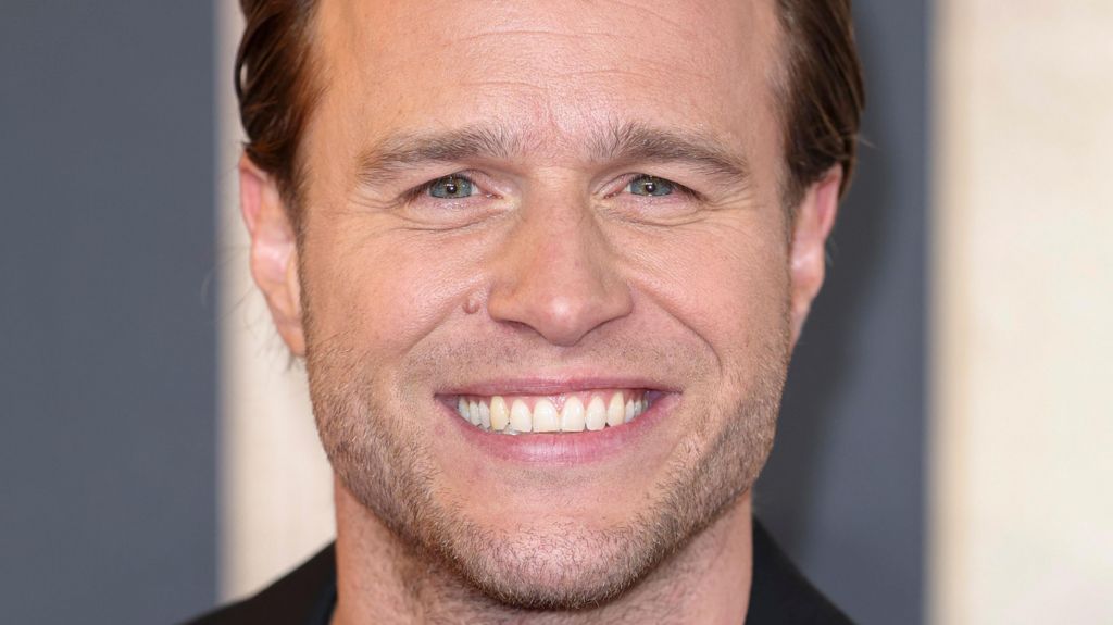 Close-up of singer Olly Murs smiling
