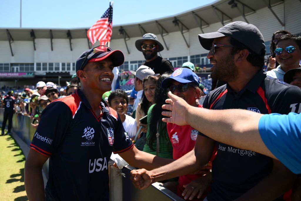 USA bowler Nosthush Kenjige, who took 3-30, is congratulated by supporters at the  Grand Prairie Stadium