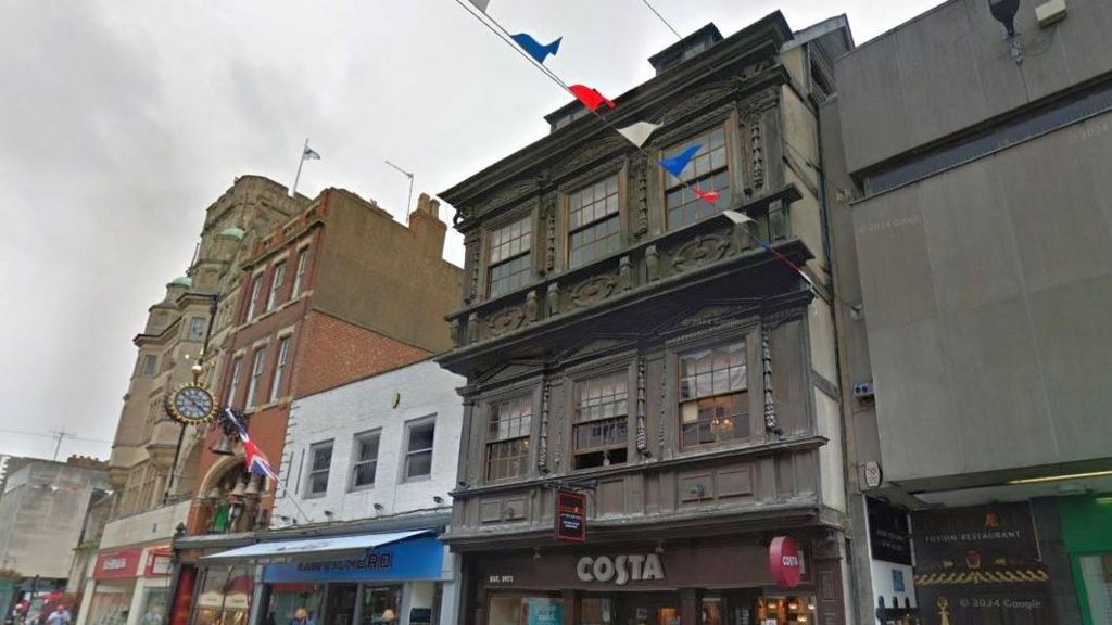 The Old Bell Inn facade on Southgate Street in Gloucester.