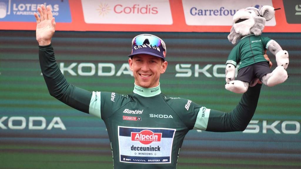 Australian cyclist Kaden Groves celebrates on the podium after winning stage 17 of the 2024 Vuelta a Espana