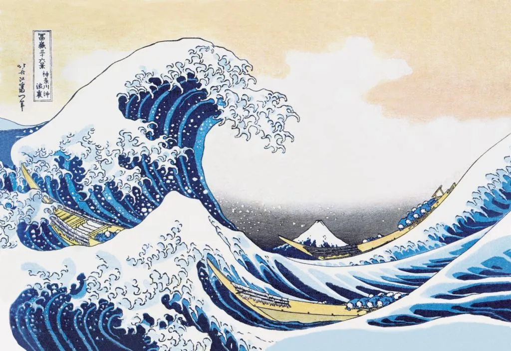 Hokusai's The Great Wave off Kanagawa. A painting of a large blue wave with white seafoam. A snow-capped mountain sits in the background.