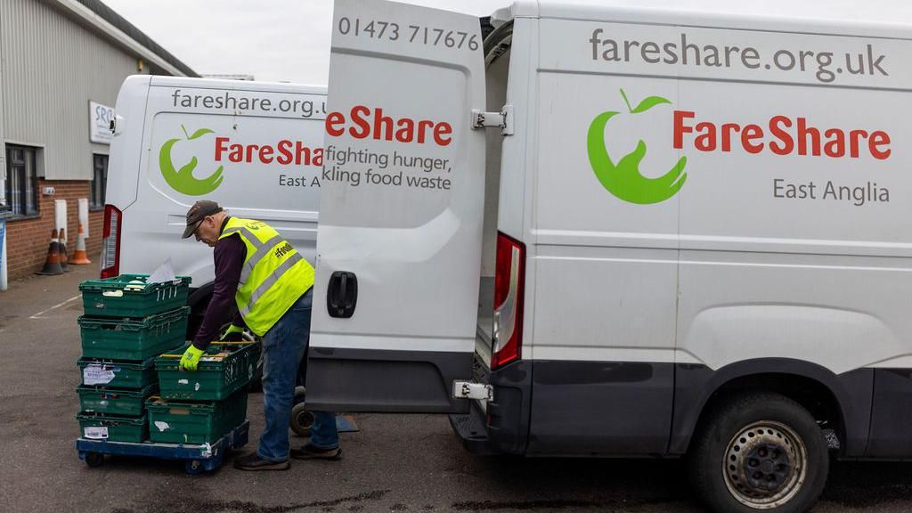 Man unloading a FareShare East Anglia van