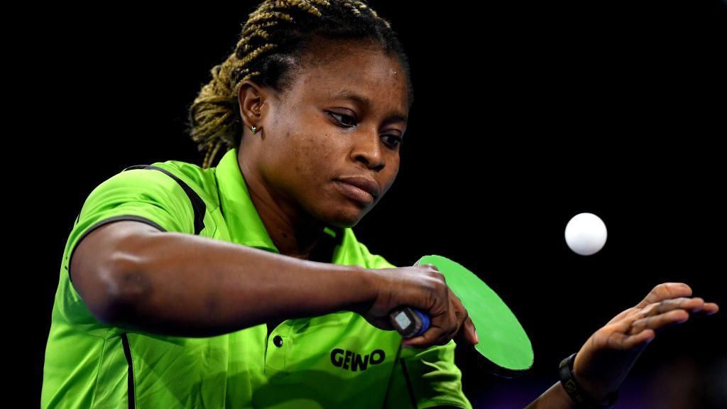 Christiana Alabi serves during a match at the Commonwealth Games