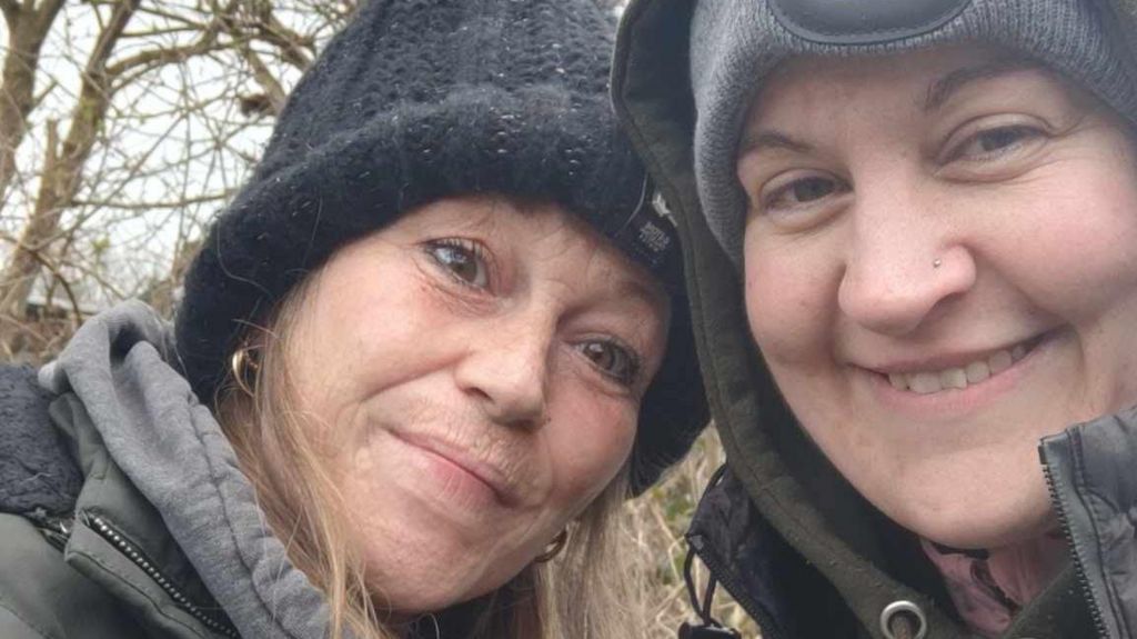 A selfie of Gill Shilvock and Christy Perry wearing woolly hats as they go magnet fishing