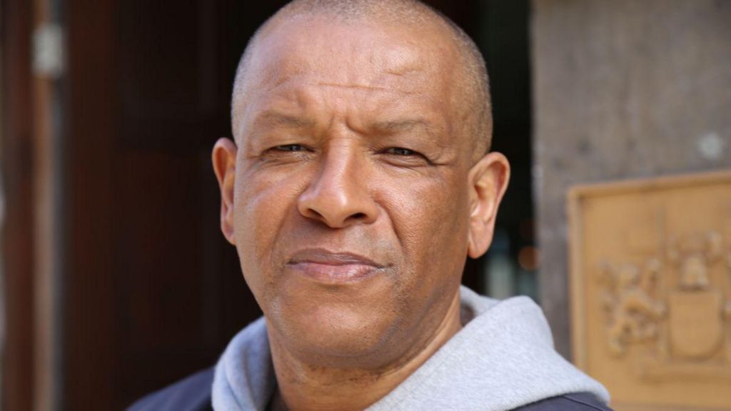 Howard Gayle, looking straight into the camera.