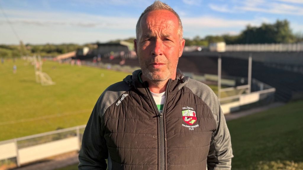 Chairman of Killeeshil St Mary's GAA Colm Rafferty, staring at the camera