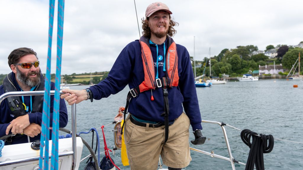 Former soldier Craig Wood, 33, on a boat