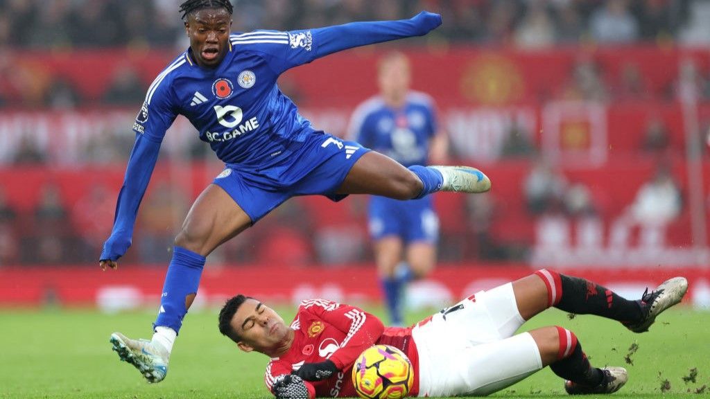 Manchester United midfielder Casemiro slides in to tackle Leicester's Abdul Fatawu