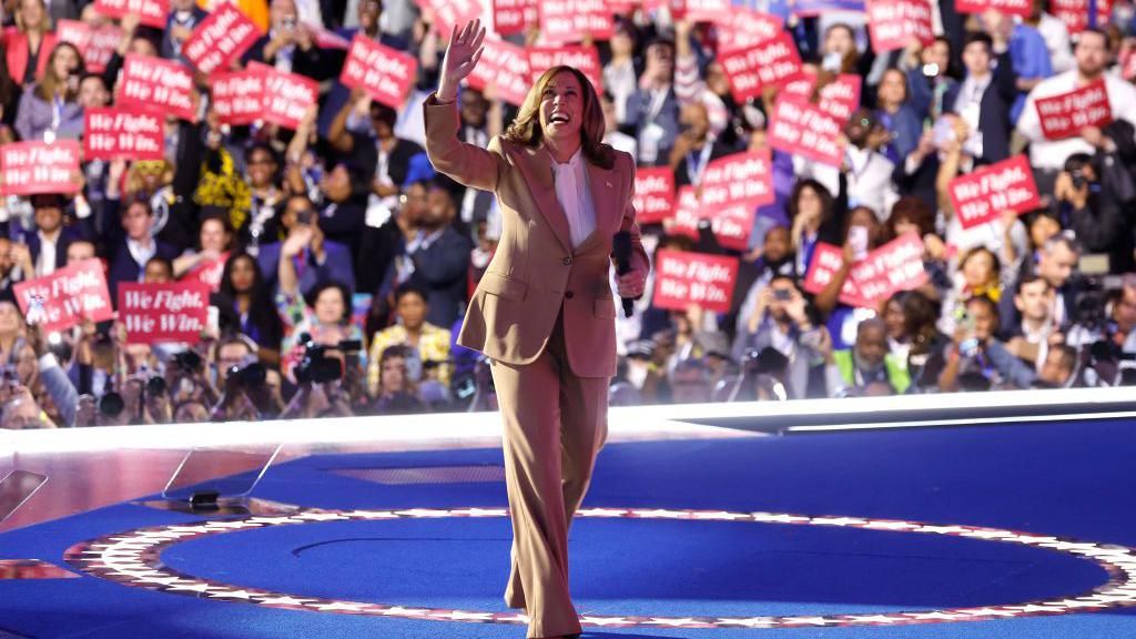 Vice-President Kamala Harris speaks onstage during the first day of the Democratic National Convention in Chicago