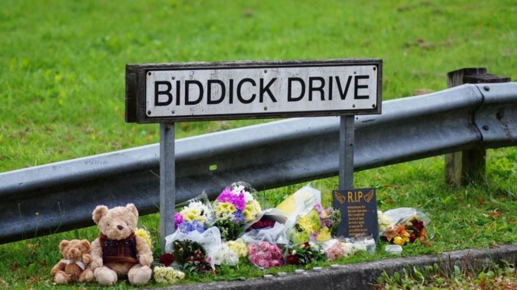 Tributes left under a Biddick Drive street sign