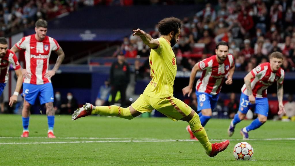 Mohamed Salah scores a penalty against Atletico Madrid