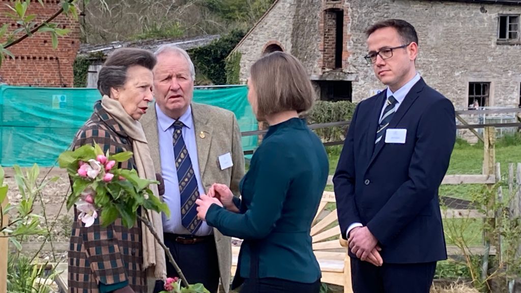 Princess Anne talking to some people