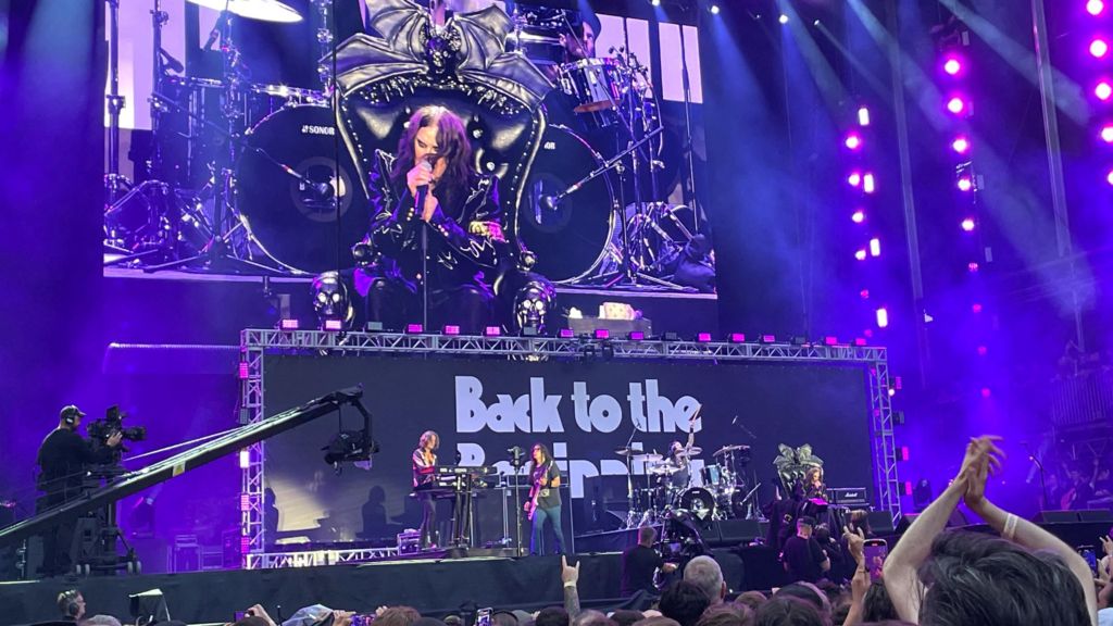 Ozzy Osbourne is seen on a screen as he performs at the Black Sabbath's farewell show