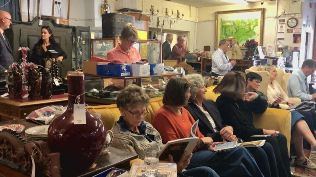 People at an auction in Guernsey