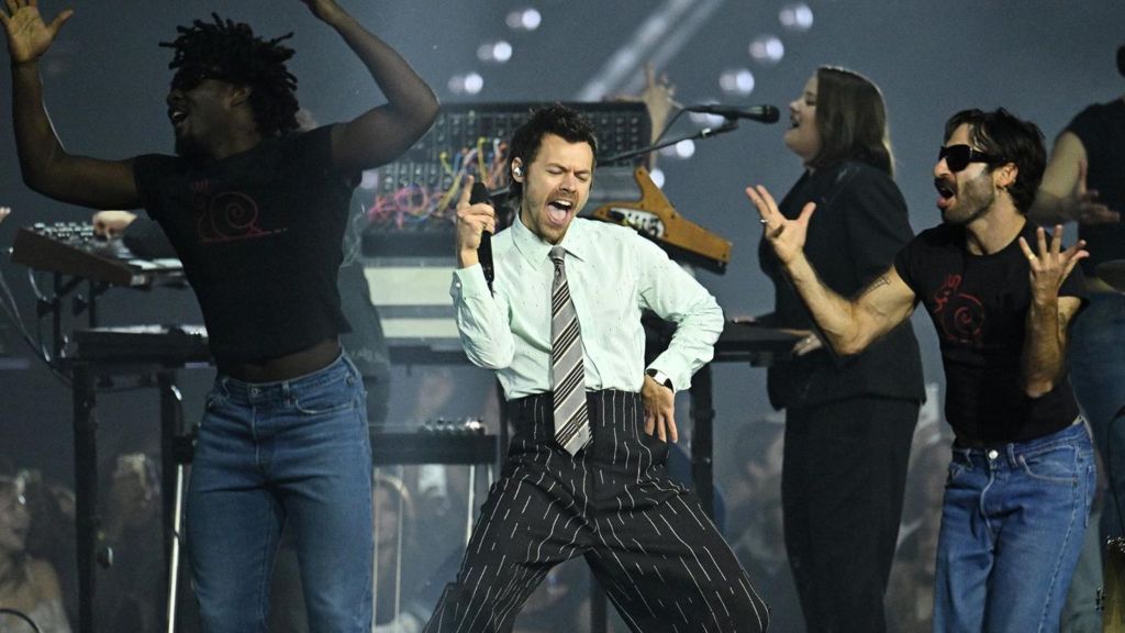 Harry Styles dancing on stage