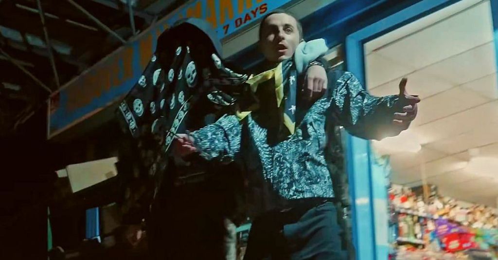 EsDeeKid and Timothée Chalamet appearing in a drill music video outside an off-licence