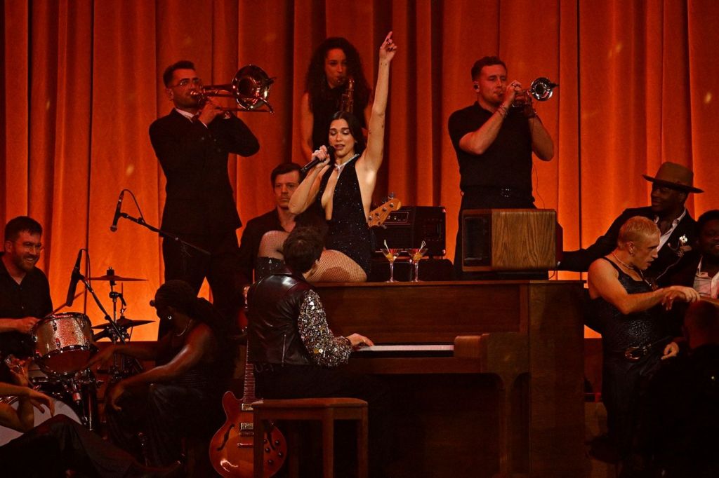 Dua Lipa peforms with Mark Ronson during the Brit Awards 2026 at Co-op Live, Manchester. Picture date: Saturday February 28, 2026. PA Photo. Photo credit should read: Doug Peters/PA Wire