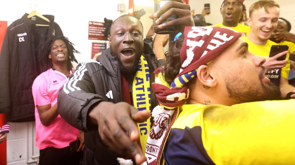 Music superstar and AFC Croydon Athletic co-owner Stormzy celebrates the club's promotion to the Isthmian League South East Division in May 