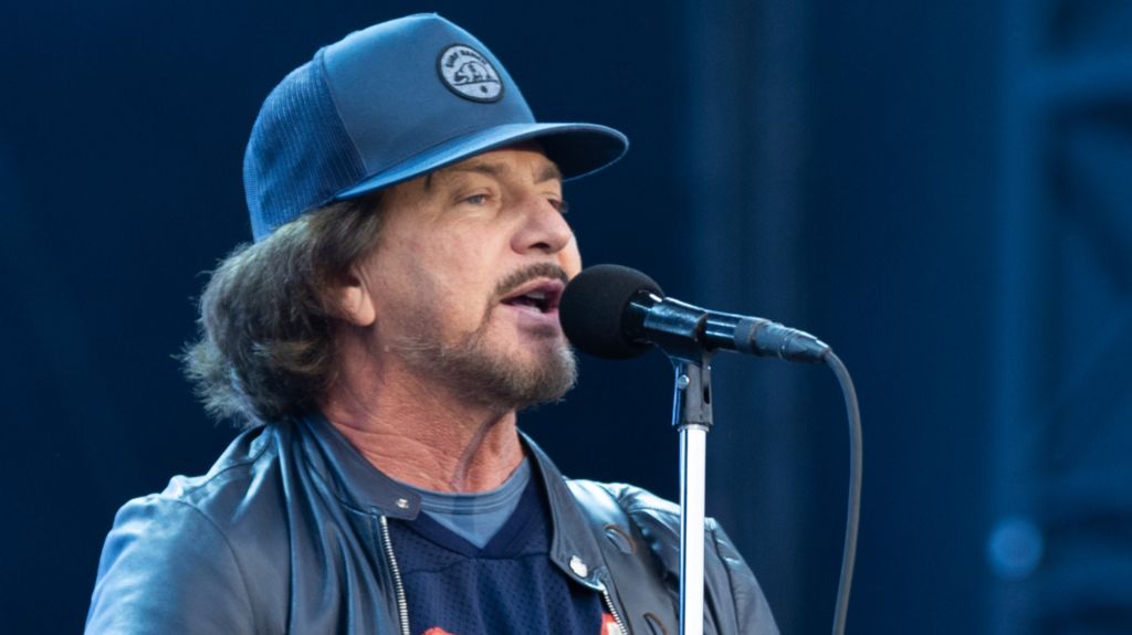 Pearl Jam's Eddie Vedder performing on stage