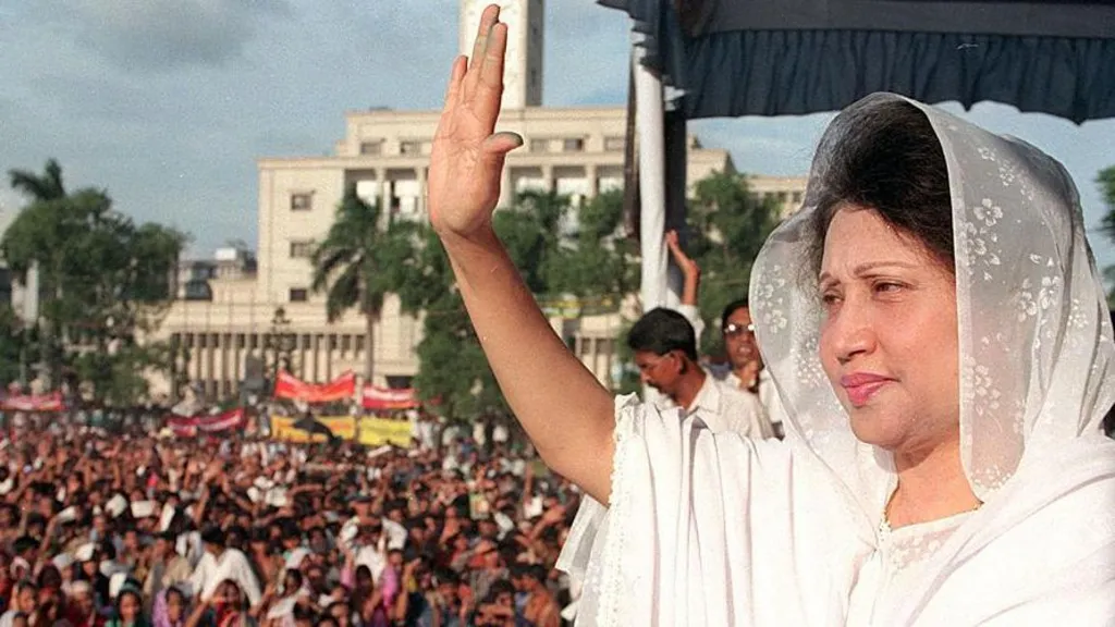 Khaleda Zia waves at her supporters 22 June before addressing a protest rally at Dhaka's downtown Paltan Maidan ground.