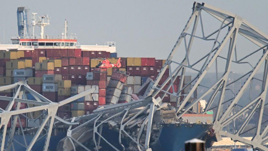 M/V Dali under the remains of the Key Bridge in Baltimore