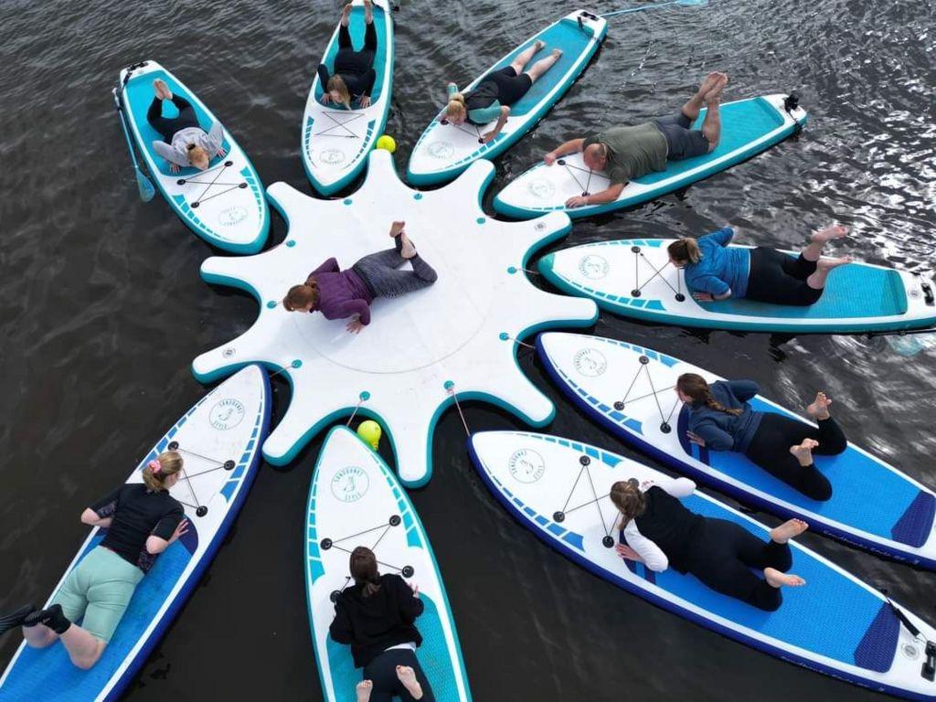 Yoga class on paddleboards