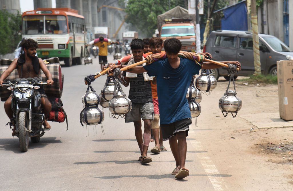 Kanwarias coming with Kanwar from Haridwar, on July 21, 2024 in Ghaziabad, India. 