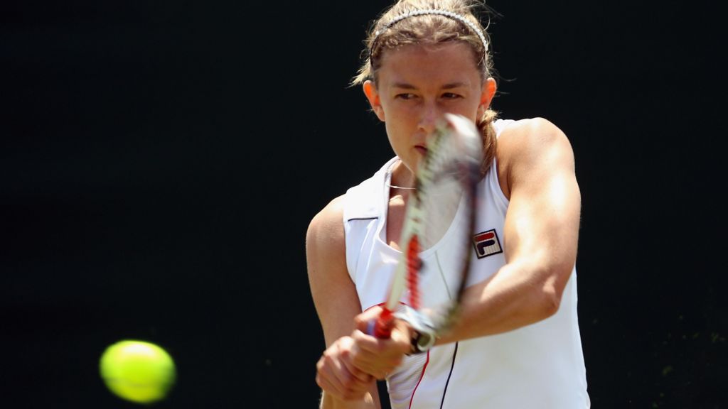 Former tennis player Dr Anna Fitzpatrick playing a tennis match in 2011