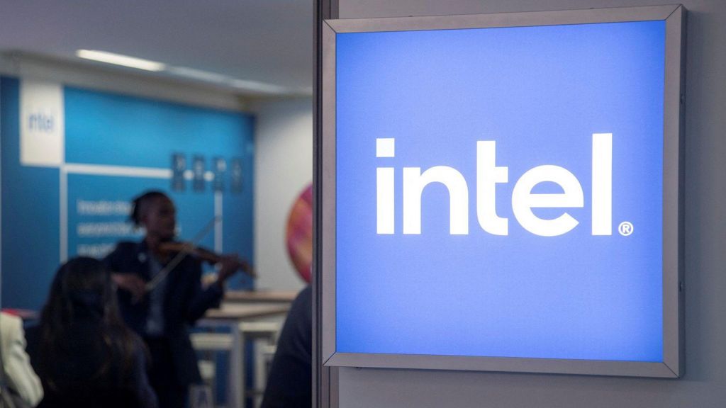 Intel sign with people in the background