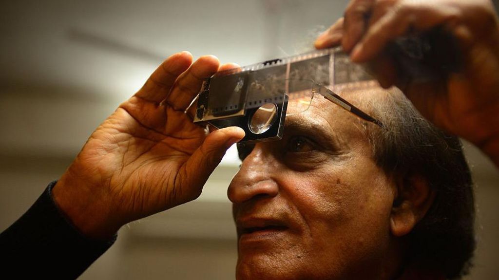 Eminent Photographer Raghu Rai, who began taking pictures that document contemporary India, on work at his Mehrauli office on January 8, 2015 in New Delhi, India. (Photo by Pradeep Gaur/Mint via Getty Images)