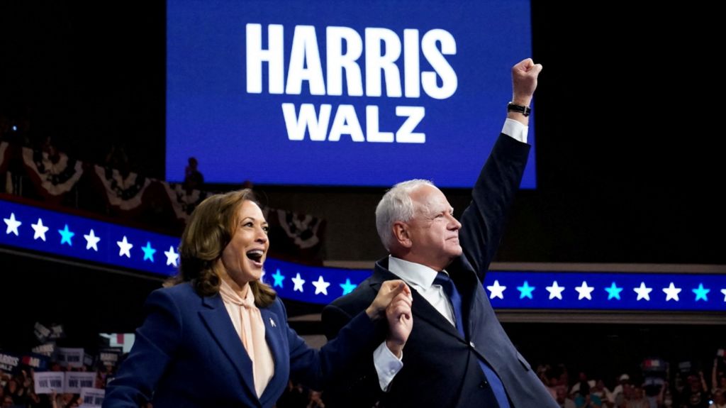 U.S. Vice President and Democratic presidential candidate Kamala Harris and her newly chosen vice presidential running mate Minnesota Governor Tim Walz react as they hold a campaign rally in Philadelphia