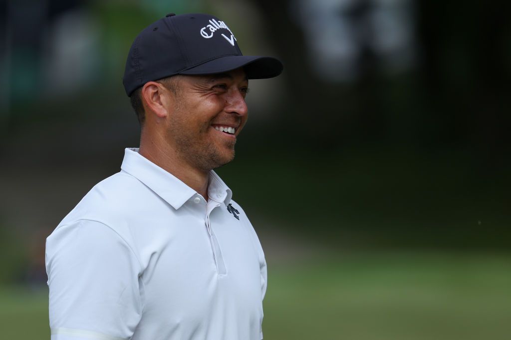 Xander Schauffele smiles while playing at the US PGA Championship