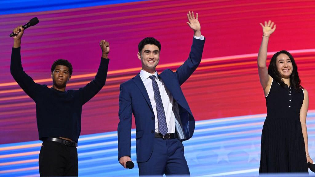 Alexander Hudlin, Jasper Emhoff and Arden Emhoff speak onstage at the Democratic National Convention