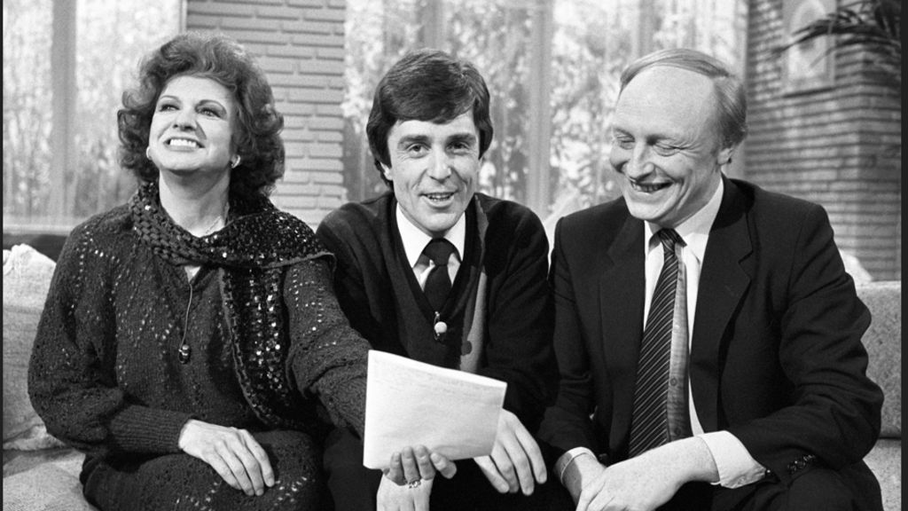 Former Coronation Street star Pat Phoenix laughs alongside John Stapleton and Labour leader Neil Kinnock in a TV studio