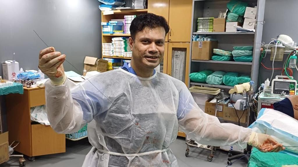 Dr Junaid Sultan in medical attire