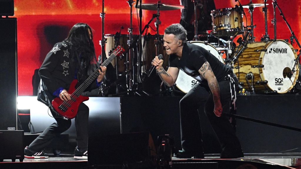 Robbie Williams on stage at the Brit Awards