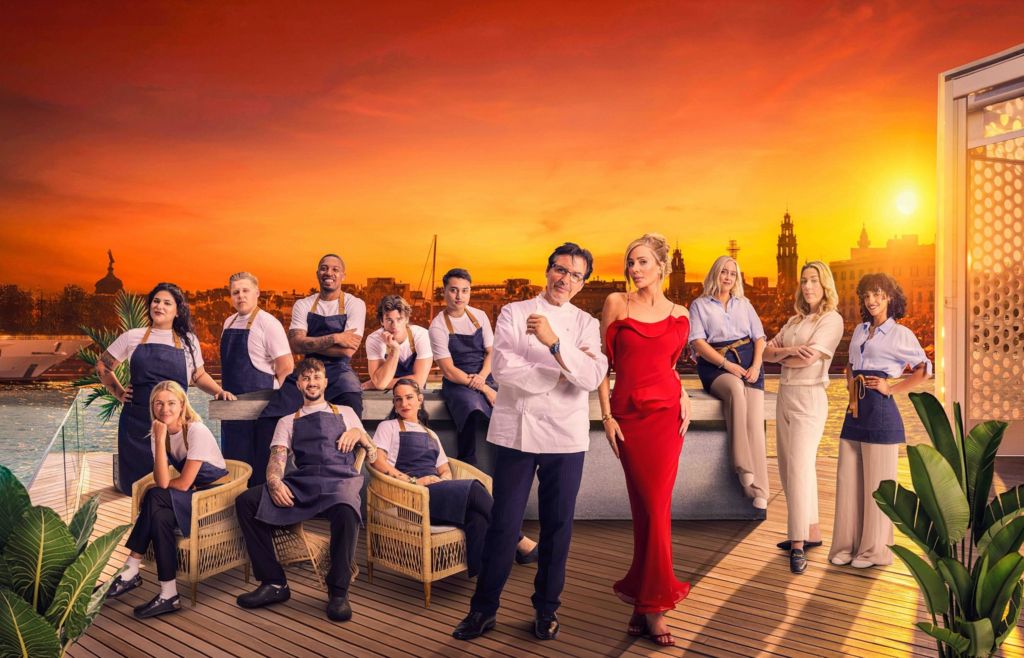 Picture of Jean-Christophe Novelli and Olivia Attwood with 10 contestants set against a backdrop of Barcelona