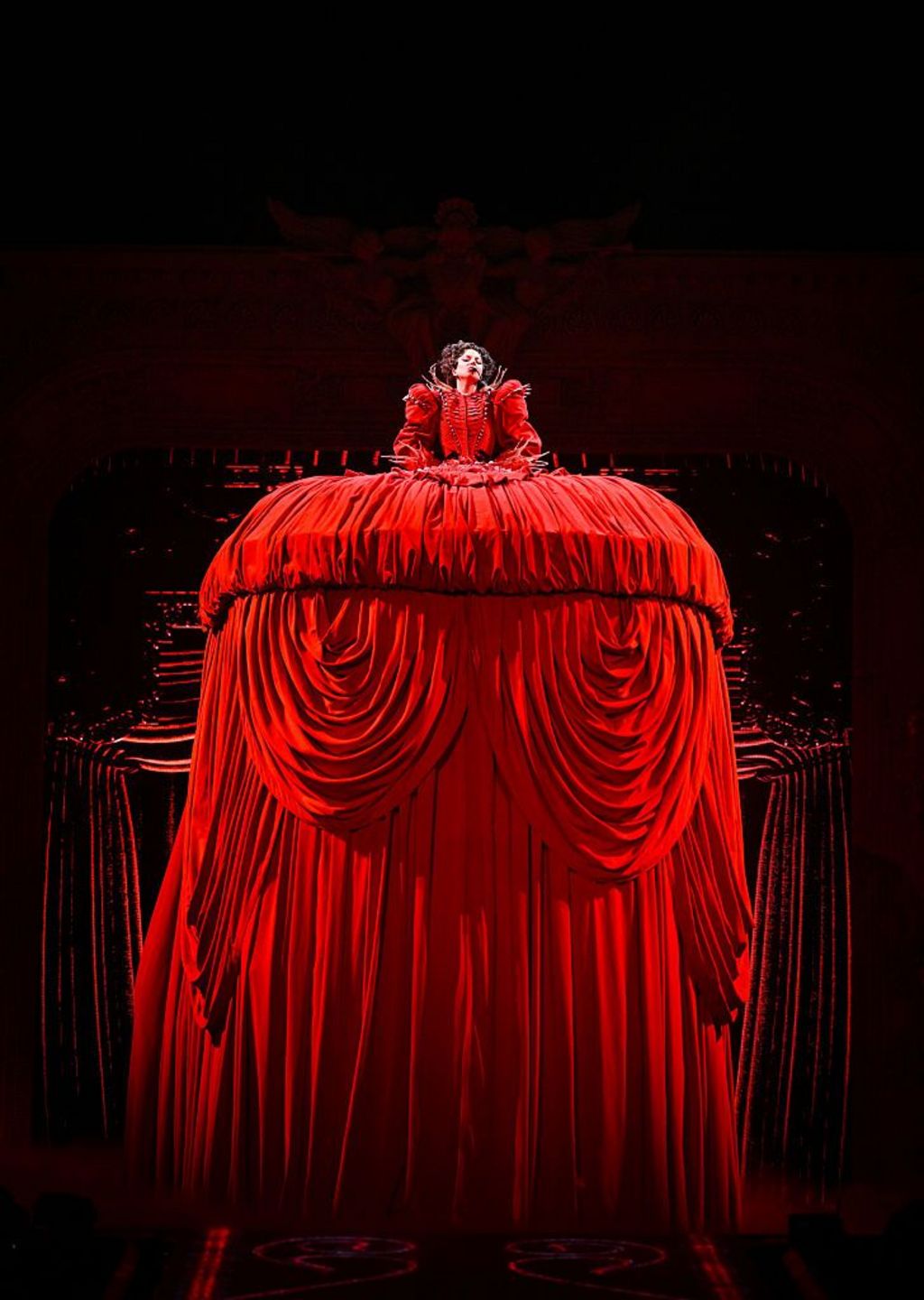 Lady Gaga in a towering red dress