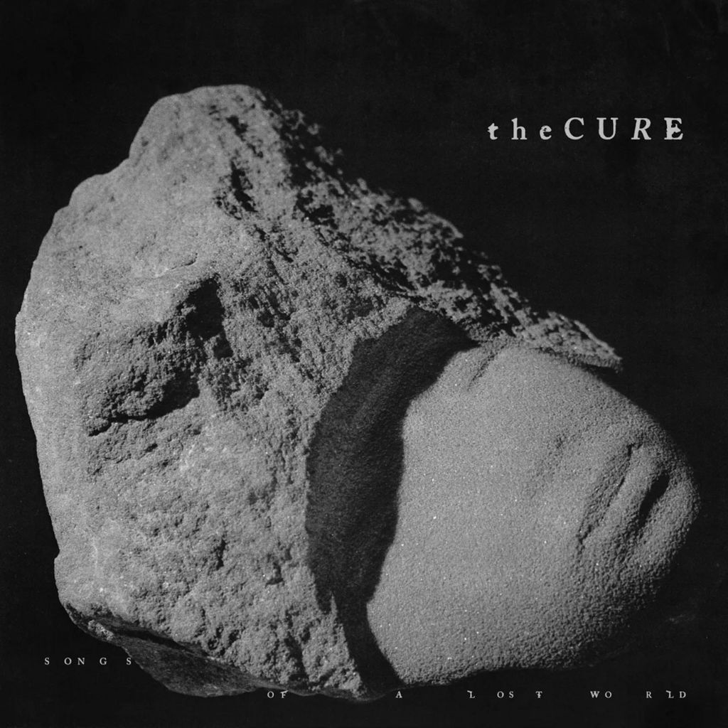 Artwork for The Cure's album, Songs Of A Lost World it shows a lump of grey rock